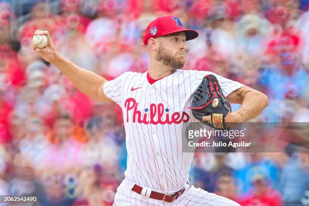 Zack Wheeler of the Philadelphia Phillies delivers a pitch to the Baltimore Orioles in the first inning during a 2024 Grapefruit League Spring...