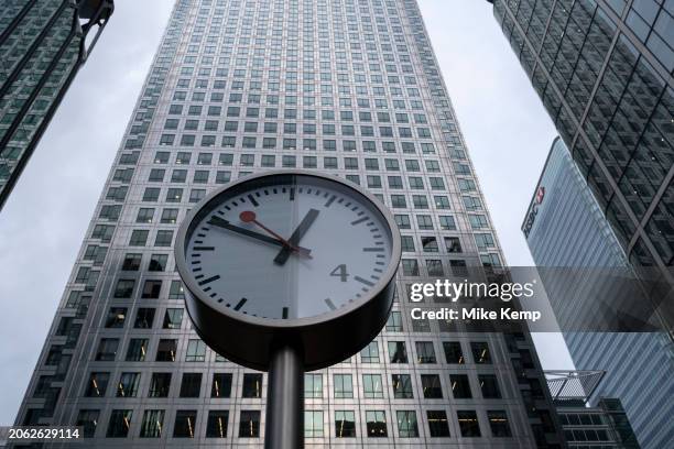 One of the Six Public Clocks, a sculpture by Konstantin Grcic at Nash Court in Reuters Plaza at the base of One Canada Square at the heart of Canary...