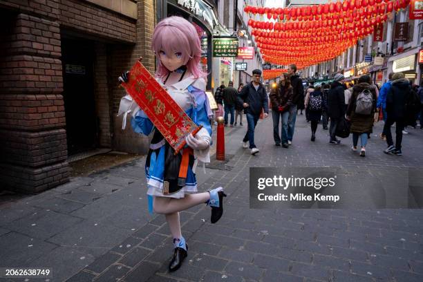 Young womoan dressed up as an animated character as people gather to celebrate the Chinese New Year of the Dragon in Chinatown on 10th February 2024...