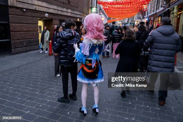 Young womoan dressed up as an animated character as people gather to celebrate the Chinese New Year of the Dragon in Chinatown on 10th February 2024...