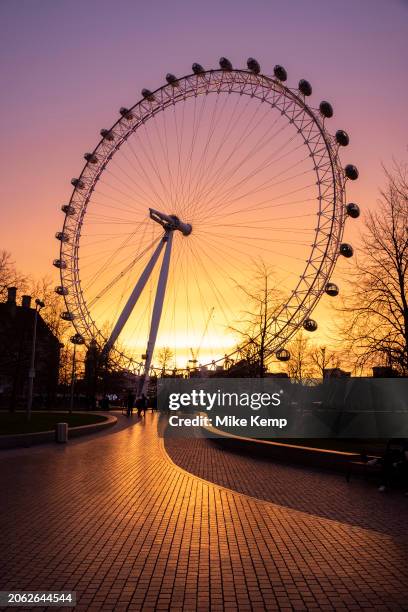 London Eye silhouette at sunset on 10th February 2024 in London, United Kingdom. The lastminute.com London Eye, or the Millennium Wheel, is a...