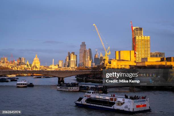 City of London skyline view looking over the River Thames and Waterloo Bridge and the South Bank at sunset on 10th February 2024 in London, United...