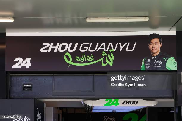 Zhou Guanyu of China and Kick Sauber's name written in arabic above the garage in pitlane during previews ahead of the F1 Grand Prix of Saudi Arabia...