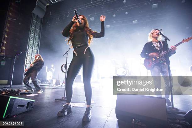 Andrew Wessen, Hannah Hooper, and Christian Zucconi of GROUPLOVE perform on stage at The Observatory North Park on March 05, 2024 in San Diego,...