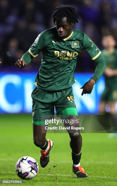 Darko Gyabi of Plymouth Argyle runs with the ball during the Sky Bet Championship match between Sheffield Wednesday and Plymouth Argyle at...