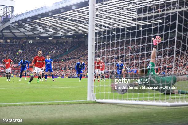 Bruno Fernandes of Manchester United scores their 1st goal with a penalty past Everton goalkeeper Jordan Pickford during the Premier League match...
