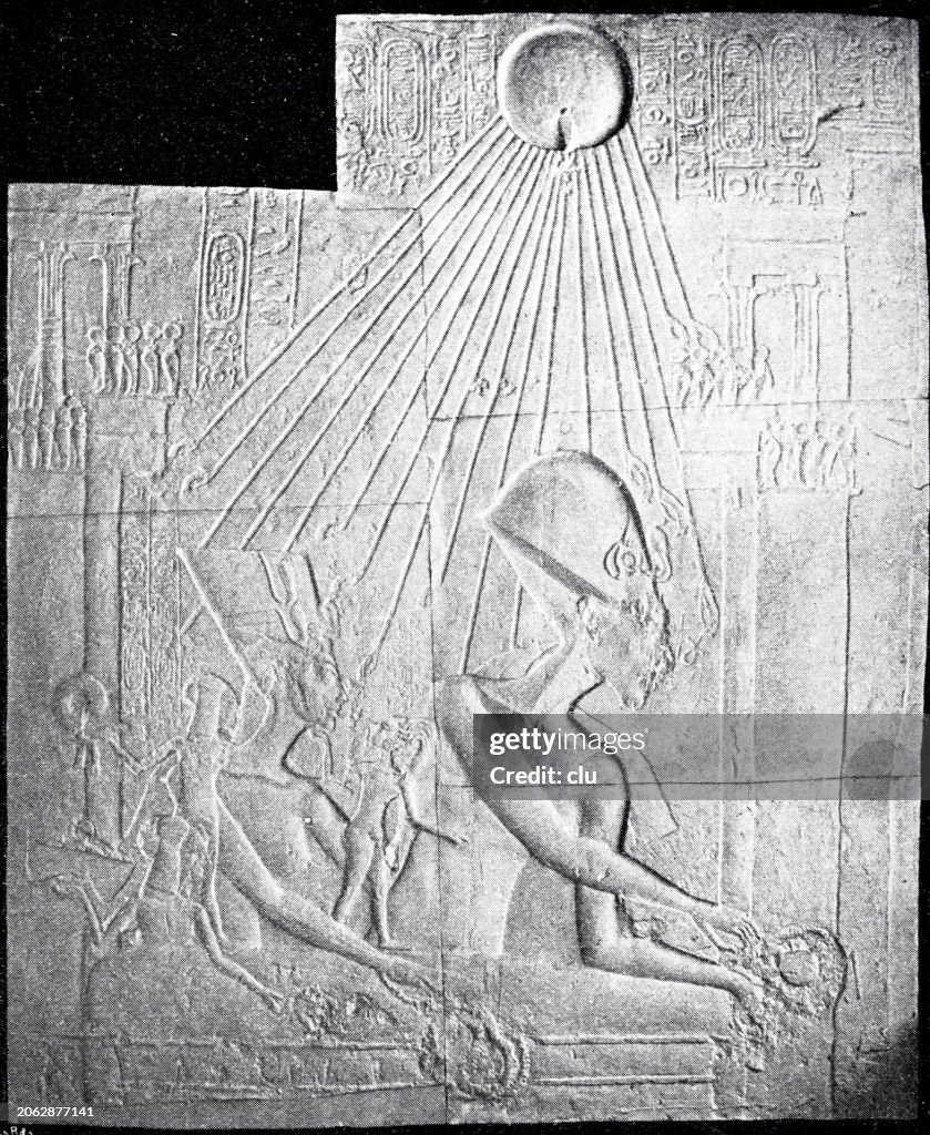 Pharaoh Akhenaten and family standing on the balcony throwing down gifts