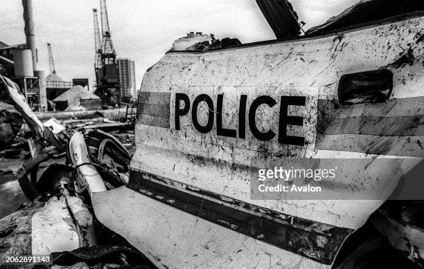 Wrecked Police Car Door, Salvage Yard Deptford, London 1990.