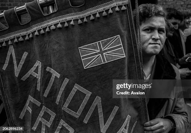 National Front Demo, Man with Union Jack Flag, Walworth, London, 1980.