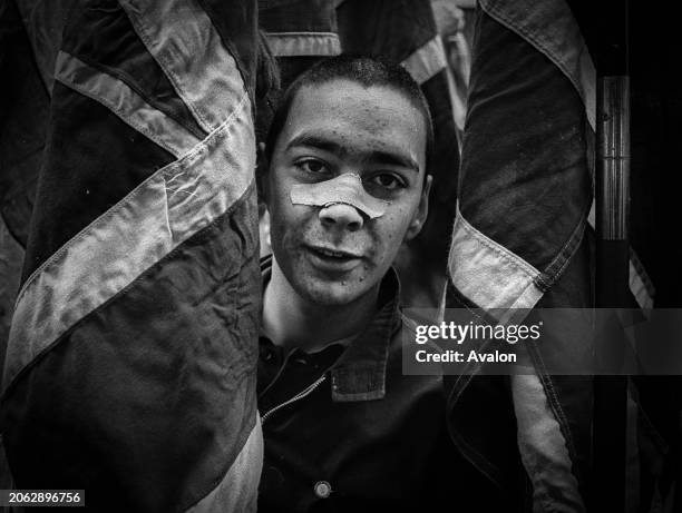 National Front Demo, Skinhead with Union Jack Flag, Walworth, London, 1980.