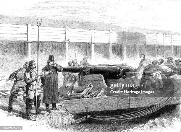 Manufacture of the Armstrong Gun at Woolwich Arsenal: the guns at the proof-butts, 1862. '... To fire a piece of ordnance...by the ordinary method of...