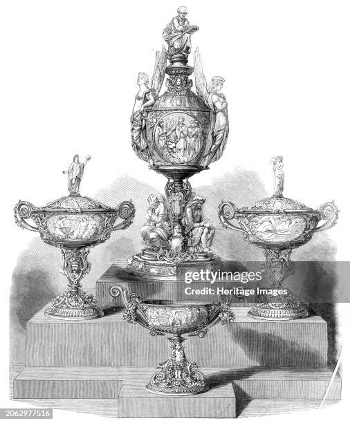 The International Exhibition: "The Poetry of Great Britain", a group of silver designed and modelled by Signor Monti and executed by Mr. C. F....