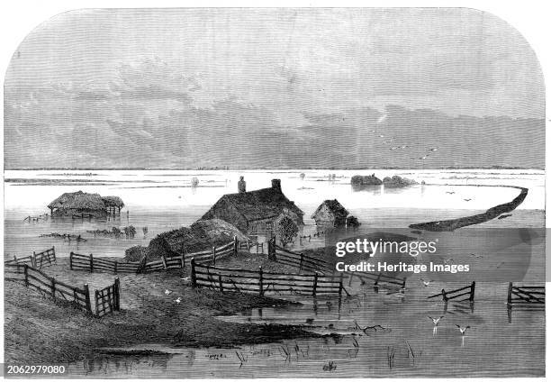 The Inundation in the Fens: scene from the drain bank, above the Coffer Dam, 1862. 'From the summit of the Middle-Level railway-bridge almost the...