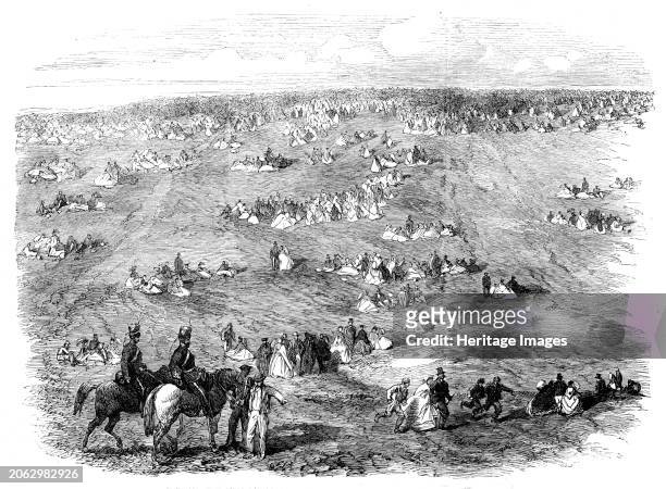 The Volunteer Field-Day at Brighton: people on the Downs, 1862. 'Nothing could be finer than the approach of something like 12,000 men in close...