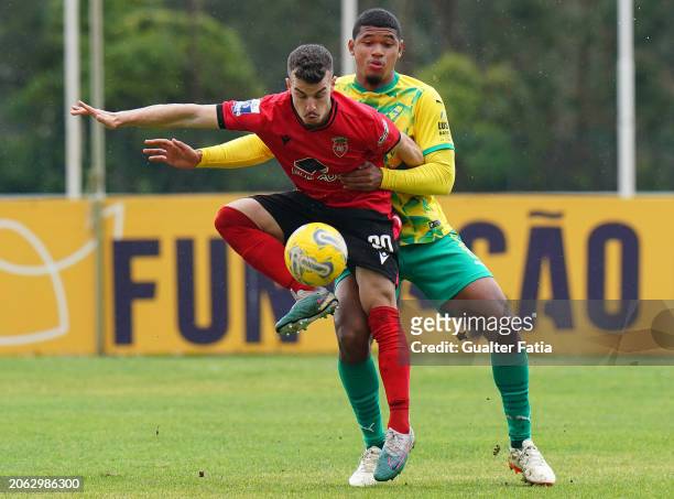 Andre Silva of FC Penafiel with Pedro Bravo of CD Mafra in action during the Liga Portugal 2 match between CD Mafra and FC Penafiel at Estadio do...