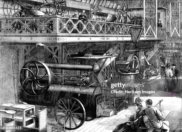 The International Exhibition: Ransome and Sims' agricultural machinery - from a photograph by the London Stereoscopic Company, 1862. 'Amongst the...