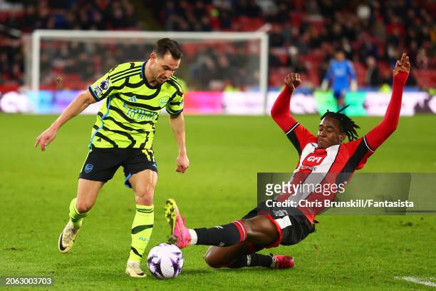 Andre Brooks of Sheffield United challenges Cedris Soares of Arsenal during the Premier League match between Sheffield United and Arsenal FC at...