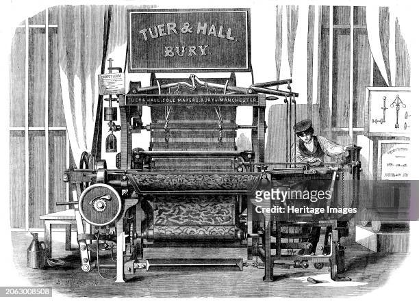 The International Exhibition: Tuer and Hall's power-loom for weaving carpets - from a photograph by the Stereoscopic Company, 1862. 'This is for the...