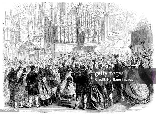 The International Exhibition: a scene near the Eastern Dome on the closing day, 1862. 'Whether from accident or with a design to draw off some of the...