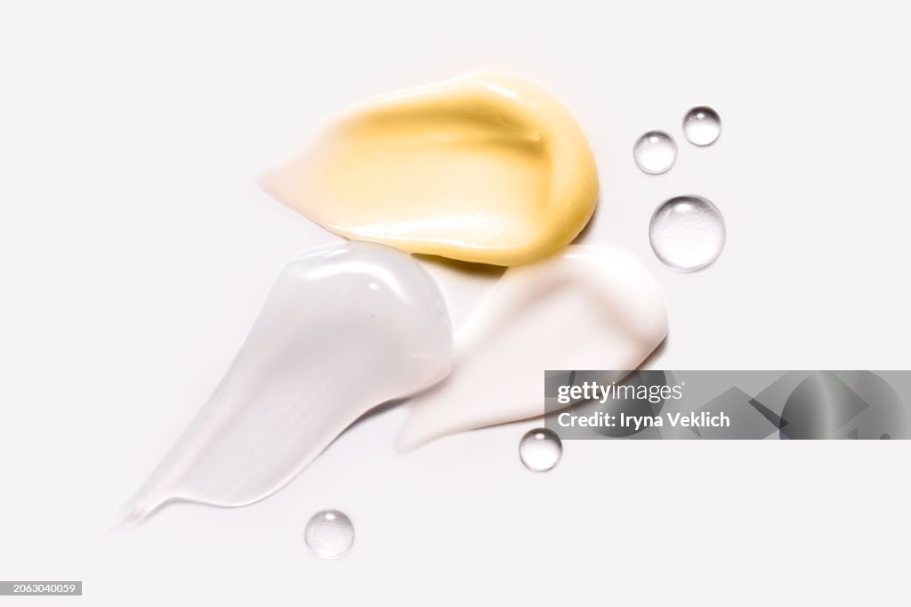 Waved Texture of Cosmetic products - Skincare Face Cream, Refreshing Hydration Water Cream, Face Gel, Hand Cream and Face Serum on white color background.