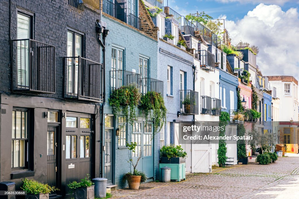 Colourful mews row houses in Notting Hill, London, England, UK