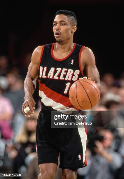 Rod Strickland, Point Guard and Shooting Guard for the Portland Trail Blazers in motion dribbling the basketball down court during the NBA Midwest...