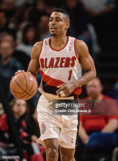 Rod Strickland, Point Guard and Shooting Guard for the Portland Trail Blazers in motion dribbling the basketball down court during the NBA Pacific...