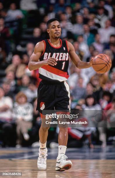 Rod Strickland, Point Guard and Shooting Guard for the Portland Trail Blazers in motion dribbling the basketball down court during the NBA Midwest...