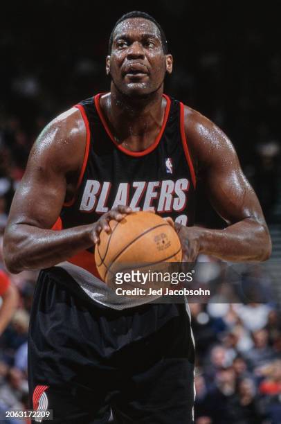 Shawn Kemp, Power Forward and Center for the Portland Trail Blazers prepares to make a free throw during the NBA Midwest Division basketball game...
