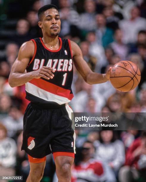 Rod Strickland, Point Guard and Shooting Guard for the Portland Trail Blazers in motion dribbling the basketball down court during the NBA Midwest...