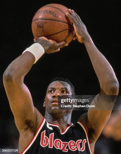 Jerome Kersey, Small Forward for the Portland Trail Blazers prepares to make a free throw shot during the NBA Pacific Division basketball game...