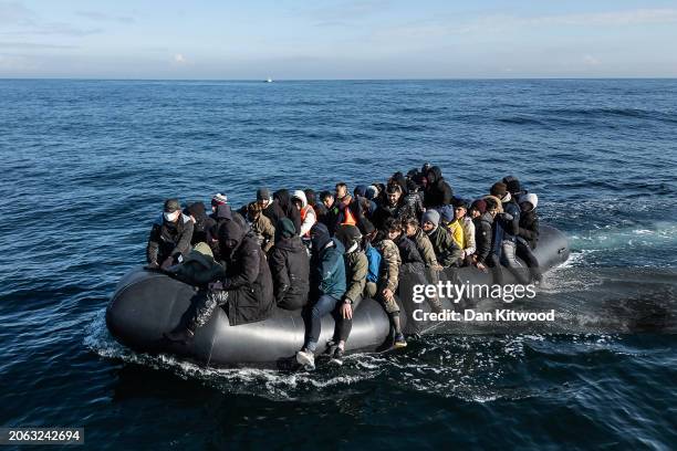 An inflatable dinghy carrying around 65 migrants crosses the English Channel on March 06, 2024 in the English Channel. According to official figures...