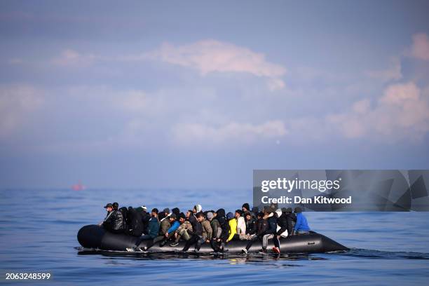 An inflatable dinghy carrying around 65 migrants crosses the English Channel on March 06, 2024 in the English Channel. According to official figures...