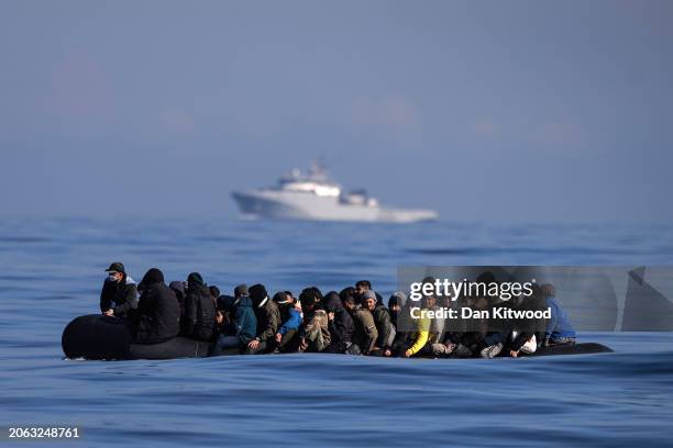 An inflatable dinghy carrying around 65 migrants crosses the English Channel on March 06, 2024 in the English Channel. According to official figures...