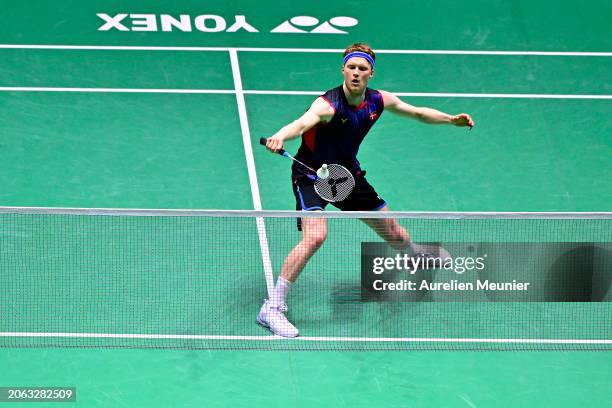 Anders Antonsen of Denmark plays a backhand on during his men single round of 32 match against CChia Hao Lee of Taiwan at Adidas Arena on March 06,...