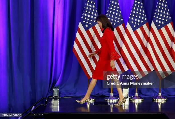 Republican presidential candidate and former U.N. Ambassador Nikki Haley walks off stage after announcing the suspension of her presidential campaign...