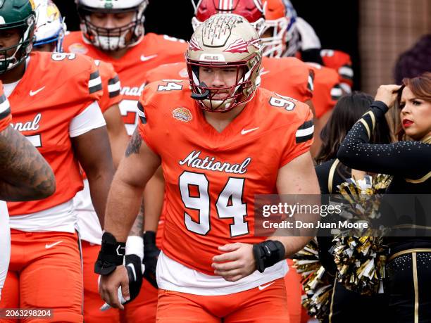 Defensive Lineman Braden Fiske of Florida State from the National Team enters the field prior to the start of the 2024 Reese's Senior Bowl at Hancock...