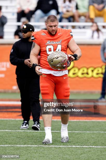 Defensive Lineman Braden Fiske of Florida State from the National Team warms up prior to the start of the 2024 Reese's Senior Bowl at Hancock Whitney...