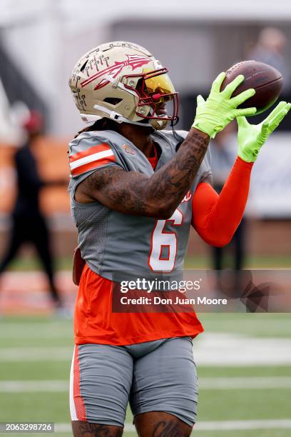 Tight End Jaheim Bell of Florida State from the American Team warms up prior to the 2024 Reese's Senior Bowl at Hancock Whitney Stadium on the campus...