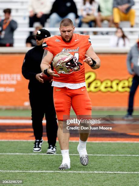 Defensive Lineman Braden Fiske of Florida State from the National Team warms up prior to the start of the 2024 Reese's Senior Bowl at Hancock Whitney...