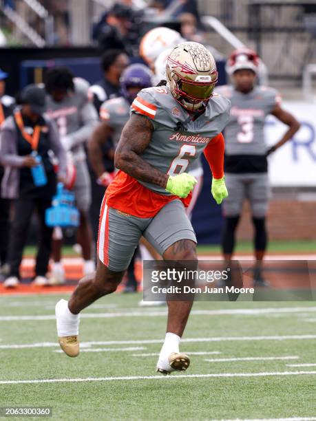 Tight End Jaheim Bell of Florida State from the American Team warms up prior to the 2024 Reese's Senior Bowl at Hancock Whitney Stadium on the campus...