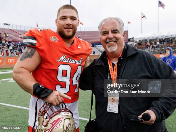 Defensive Lineman Braden Fiske of Florida State from the National Team pose with Warchant.com Managing Editor Ira Schoffel after the 2024 Reese's...