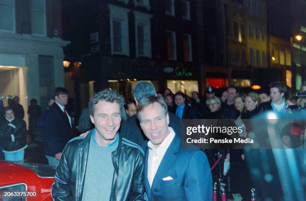 Tommy Hilfiger and guests attend the opening party for a Tommy Hilfiger store on New Bond Street in London, England, circa late February 1999.