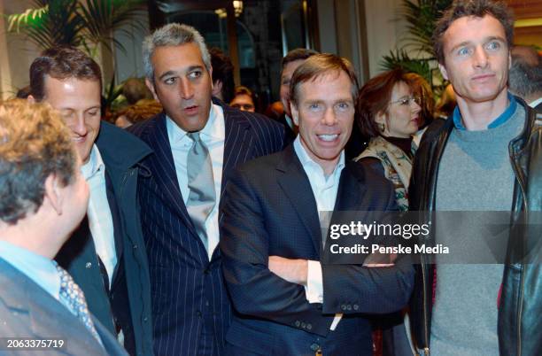 Tommy Hilfiger and guests attend the opening party for a Tommy Hilfiger store on New Bond Street in London, England, circa late February 1999.