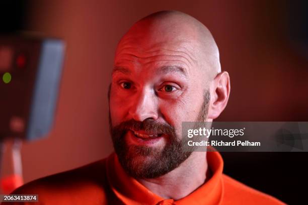 Tyson Fury looks on at the press conference ahead of the 'Knockout Chaos' Heavyweight fight between Anthony Joshua and Francis Ngannou at Boulevard...