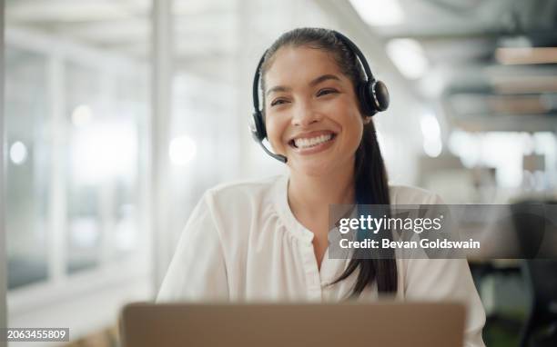 woman, call center and computer in night, smile or listening for customer service with voip in office. consultant, person or telemarketing agent for thinking, headphones and microphone for contact us - callcenter bildbanksfoton och bilder