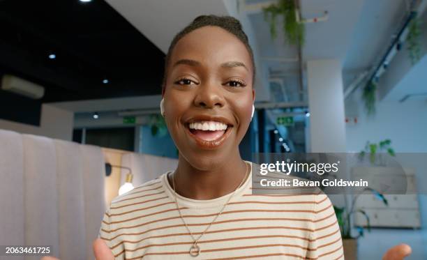 business, woman or portrait on video call with networking for virtual seminar or online conference in office. communication, black employee or face with earphones for webinar, digital chat or meeting - språk bildbanksfoton och bilder