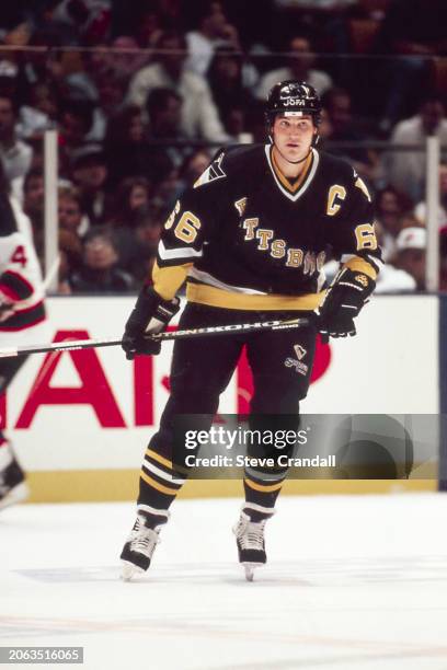 Pittsburgh Penguins forward, Mario Lemieux, looks to receive a pass during the game against the NJ Devils at the Meadowlands Arena ,East Rutherford,...