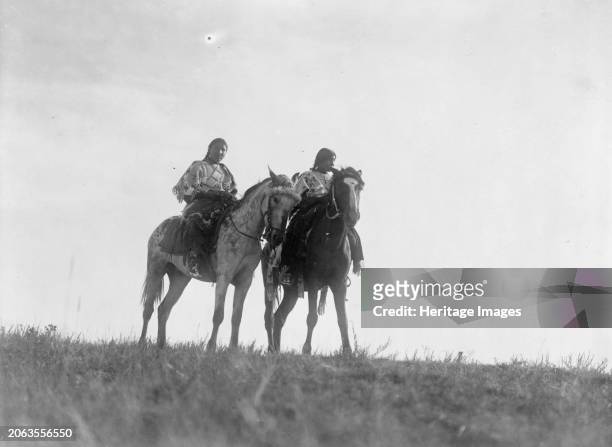 Ogalala[sic] girls, circa 1907. Two girls on horseback. Creator: Edward Sheriff Curtis.