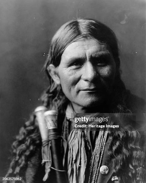 Santa Clara man , circa 1905. Oyegi-a ye , a Tewa Pueblo Indian, head-and-shoulders portrait, facing front. Creator: Edward Sheriff Curtis.